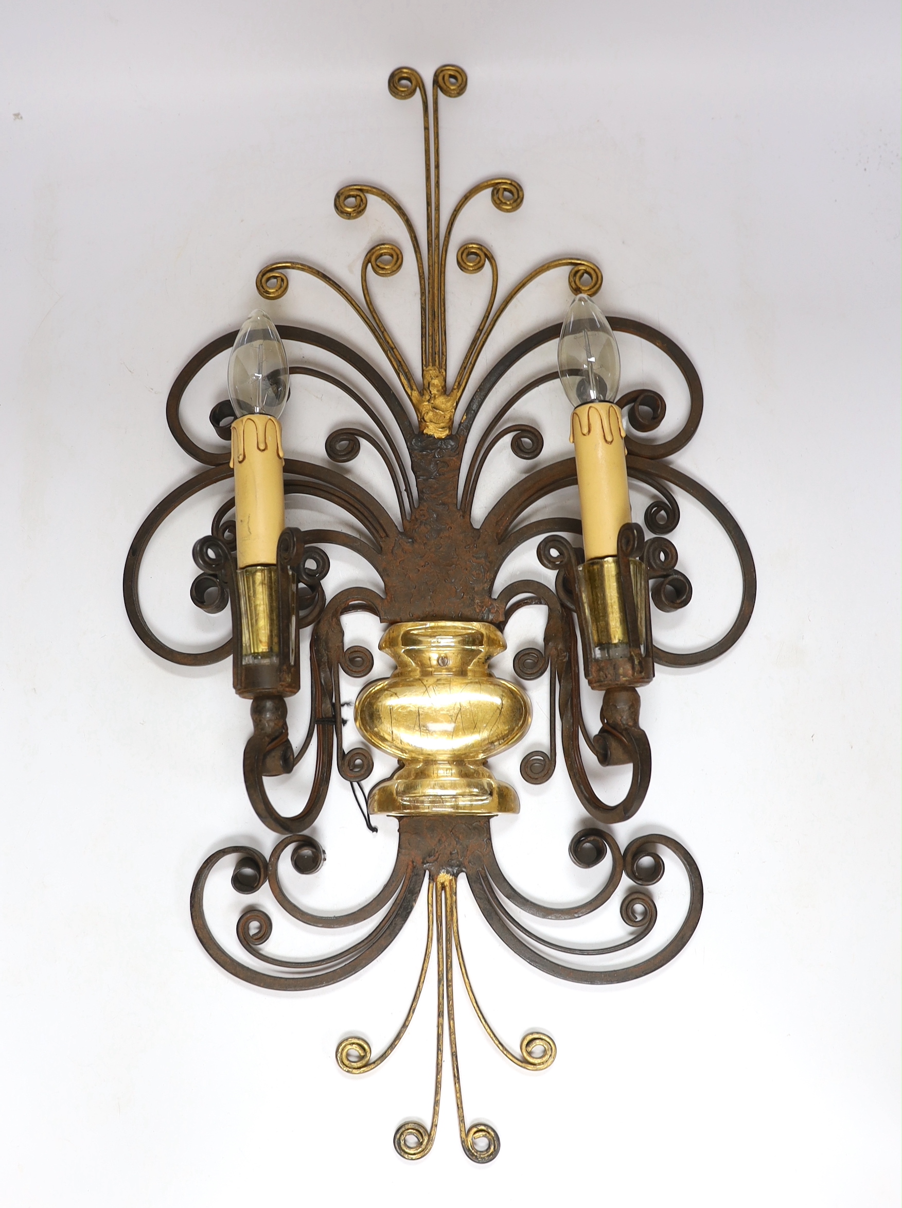 A Maison Bagues wrought iron and glass wall light, 50cm high